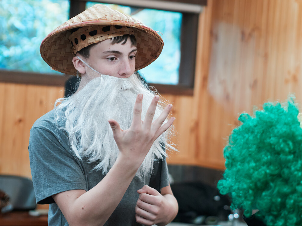 5 fingers and a long white beard